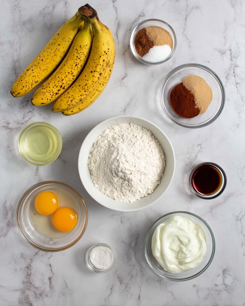 A white marbled surface holds several clear glass bowls with ingredients arranged in a loose circle. In the center, a white bowl is filled with white flour. To the top left, a bunch of four yellow bananas with brown spots rests directly on the surface. Above the flour bowl, a small clear bowl holds three powders in separate piles: white, light brown, and reddish brown. To the top right, another small clear bowl contains light brown sugar. At the bottom left, a clear bowl holds a pale yellow liquid, likely oil. Below the flour bowl, a clear bowl with two raw eggs shows bright orange yolks and transparent whites. To the bottom right, a smaller clear bowl contains dark brown liquid, probably vanilla extract. Near the middle right, a clear bowl filled with white creamy yogurt is visible. photo taken with an iphone --ar 4:5 --v 7