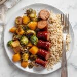 Maple Sheet Pan Smoked Sausage with Butternut and Brussels Recipe
