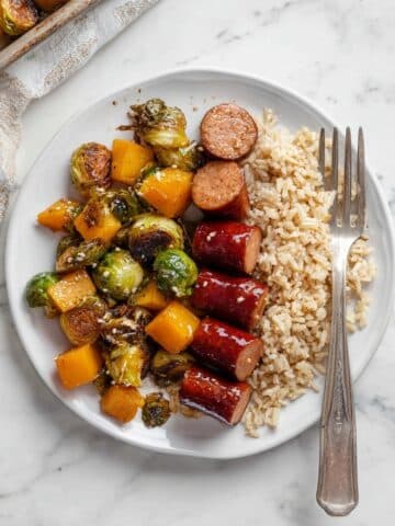 Maple Sheet Pan Smoked Sausage with Butternut and Brussels Recipe