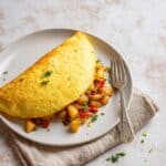 Vegan Moong Dal Omelet with Fresh Veggies and Breakfast Potatoes Recipe