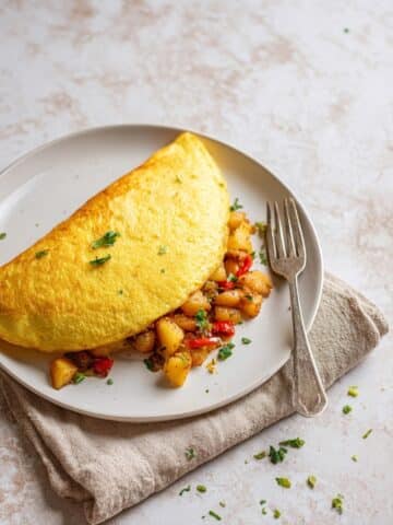 Vegan Moong Dal Omelet with Fresh Veggies and Breakfast Potatoes Recipe