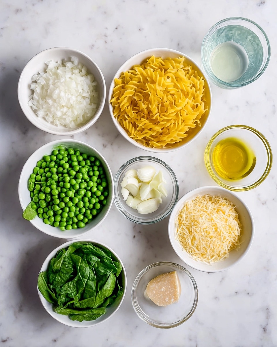 Seven white bowls are arranged on a white marbled surface. Starting from the top left, one bowl holds finely chopped white onion pieces, next to it a bowl with yellow twisted dry pasta. Below the pasta, a bowl contains fresh green spinach leaves. To the left of the spinach, a bowl is filled with bright green peas. Above the peas is a small glass bowl with thinly sliced garlic cloves, and next to it, a small glass bowl with golden olive oil. To the right between pasta and spinach bowls, a white bowl holds grated pale yellow cheese. In the top right corner, there is a glass bowl with clear liquid. photo taken with an iphone --ar 4:5 --v 7